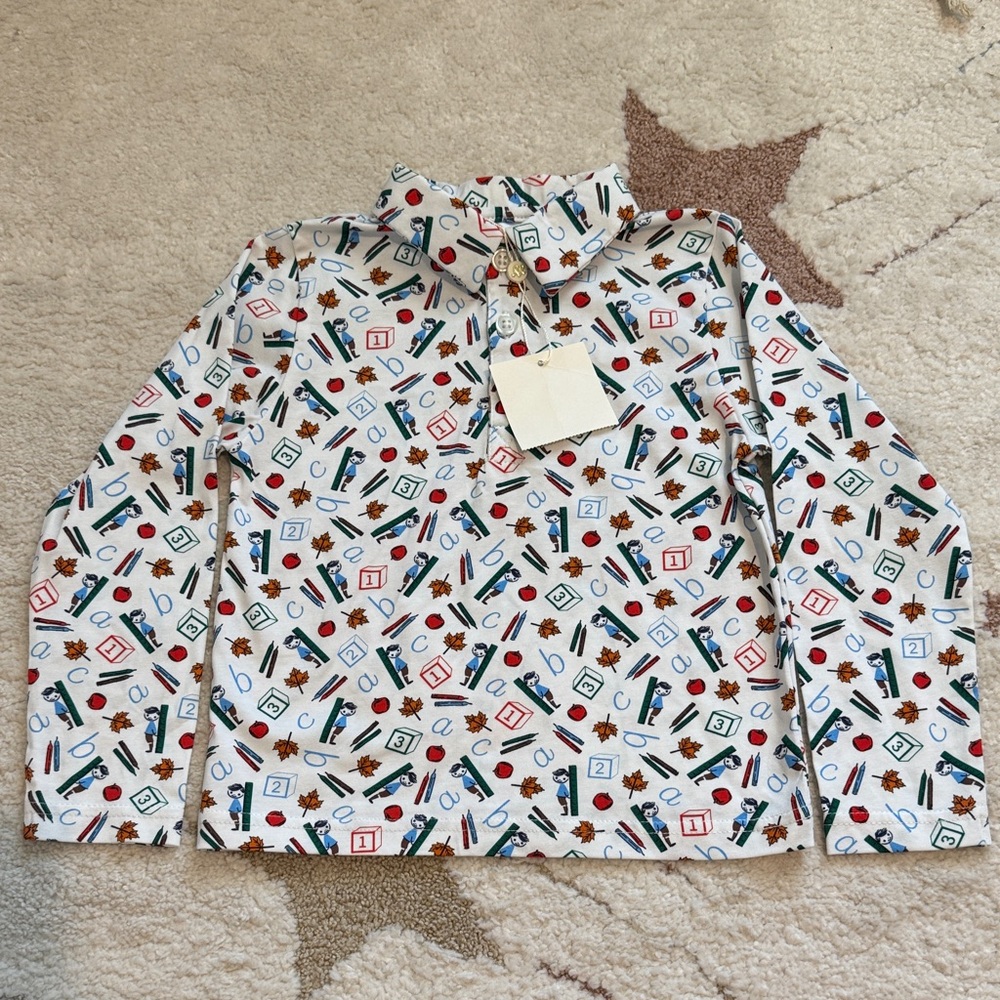 Kids Long Sleeve Printed Polo Top — White with Multicolor School Print